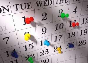 Calendar with pushpins